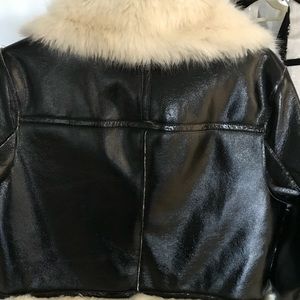 Michael Korse faux shearling patent leather jacket